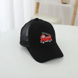 Children's black mesh baseball cap featuring a detailed red fire truck embroidery
