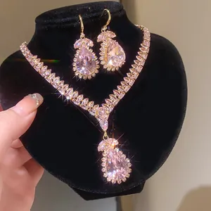 Elegant sparkling pink teardrop crystal necklace and earrings jewelry set for women