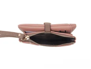 Detailed top view of pink heart printed wallet showing internal zipper compartment