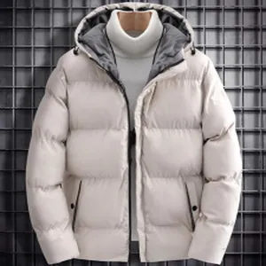 Close-up detail of a stylish white men's hooded puffer jacket with dark contrast lining