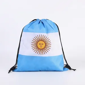 Macro detail of the Sun of May print on an Argentina national flag drawstring bag.