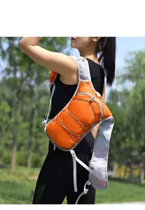 Orange running hydration vest backpack worn by a female model in an outdoor setting
