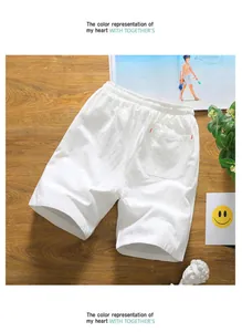 Detailed view of the breathable cotton and linen fabric on white summer shorts