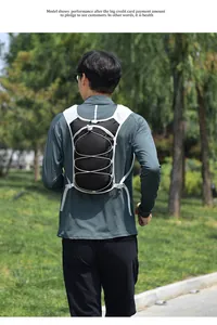 Close-up detail view of the outdoor running hydration vest backpack worn by a model