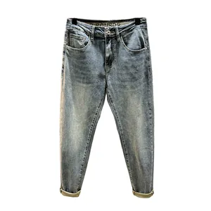 Vintage washed light blue slim fit stretch denim cropped jeans for men in retro style