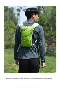 Back view of a male model wearing a lime green running hydration vest outdoors.