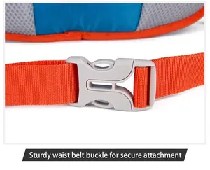 Close-up detail of a sturdy plastic buckle and orange strap on an outdoor backpack.