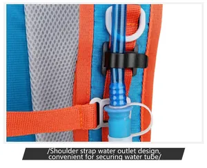 Detail view of hydration tube clip on blue and orange cycling backpack shoulder strap.