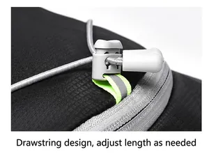 Close-up view of the adjustable drawstring toggle on a cycling hydration backpack