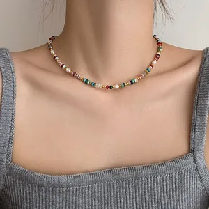 Vibrant handmade colorful freshwater pearl and natural stone beaded necklace for women.