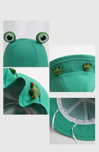 Detail view of a green frog bucket hat with adjustable drawstring and shaping wire.