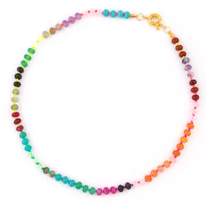Detailed view of bohemian rainbow chalcedony bead necklace with golden clasp
