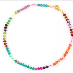Bohemian rainbow beaded necklace featuring colorful chalcedony abacus beads and gold clasp.