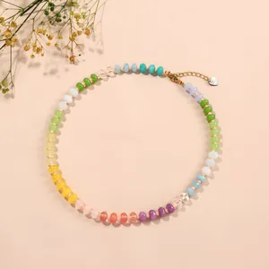 Bohemian rainbow beaded necklace with colorful flat abacus beads and a gold heart charm