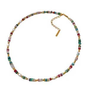 Rainbow natural stone and freshwater pearl beaded necklace with adjustable gold clasp.
