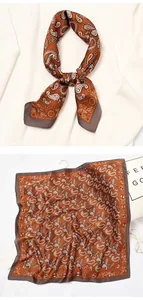 Detail view of retro brown paisley silk scarf styled as a neckerchief and flat lay