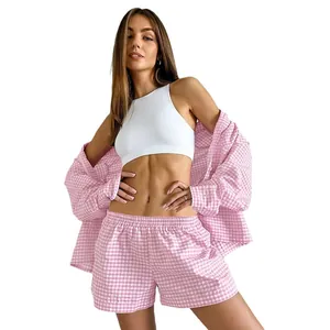 Pink gingham three-piece pajama set with white crop top and matching lounge shorts