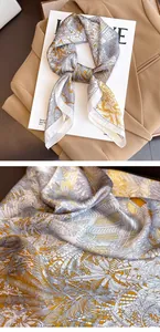 Close-up of vintage floral silk scarf texture and intricate botanical pattern detail