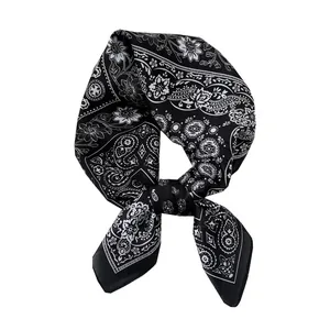 Classic vintage black and white paisley floral silk square scarf tied in a stylish knot