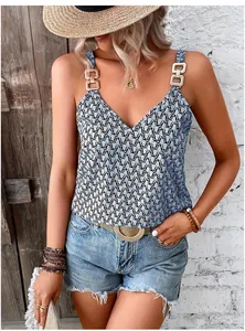 Detail view of French style V-neck camisole with metal buckles and geometric pattern