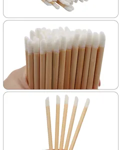 Detail shots of disposable lip brushes with eco-friendly bamboo handles and soft white tips.