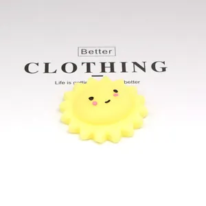 Macro view of a cute yellow sun squishy toy featuring a soft and squishy TPR texture