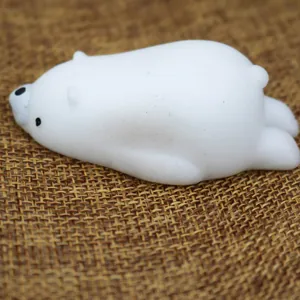 Side view detail of a soft white polar bear TPR squishy stress relief toy