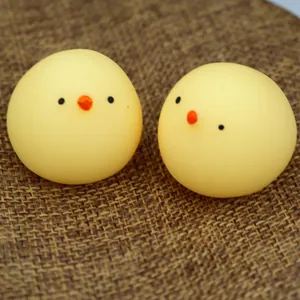 Detailed view of two cute yellow chick-shaped TPR squishy toys for stress relief