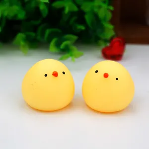 Close-up of two cute yellow chick squishy toys for stress relief and sensory play.
