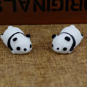 Macro view of two cute panda TPR squishy toys for effective stress relief and relaxation