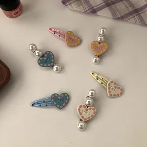 Cute pearl heart hair clips set in colorful pastel tones with LOVE engraving