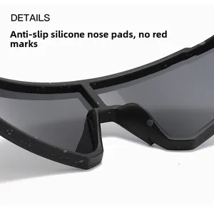 Detail view of anti-slip silicone nose pads on black children cycling sunglasses