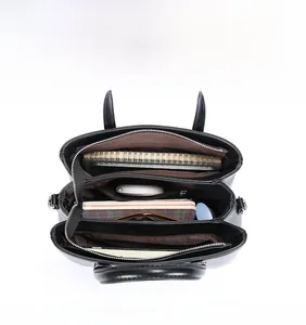 Top view of spacious black tote bag showing interior compartments and storage capacity
