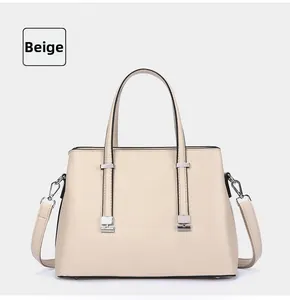 Elegant apricot tote handbag with silver hardware for daily commute and office use