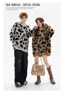 Oversized leopard print mohair sweater featuring vintage metal badges and round neck