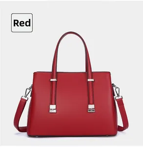 Front view of an elegant red large capacity handbag for professional office use
