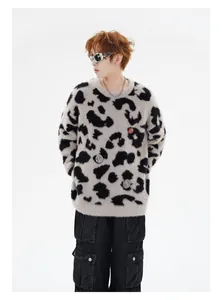 Model wearing a high-street retro leopard print mohair sweater with metal badges.