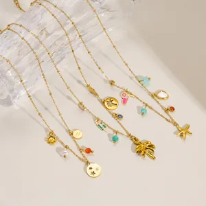 Gold-plated multi-pendant necklace set with starfish and palm tree charms