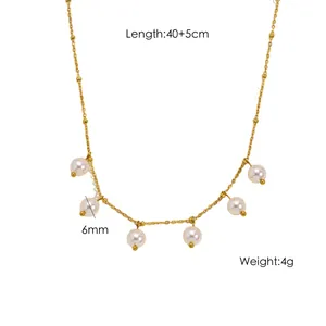 Detail view of gold plated pearl necklace with 40+5cm length and 6mm pearls