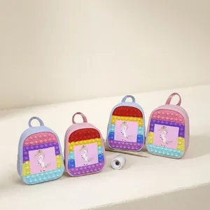 Set of unicorn silicone push bubble sensory backpacks for kids in multiple rainbow colors