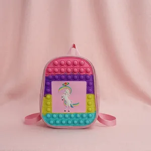 Detailed view of the colorful unicorn pop-it silicone backpack for kids and students