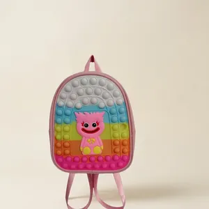 Kids colorful silicone pop-it backpack featuring cute pink character design for school