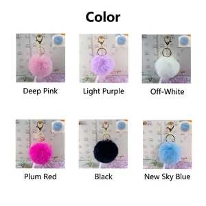 Selection of 8cm colorful soft faux fur pom pom keychains for bags and accessories