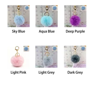 Detailed showcase of colorful 8cm faux fur pom-pom keychains in multiple vibrant shades