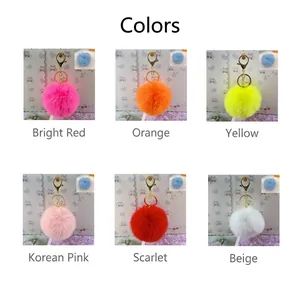 Variety of 8cm soft faux rex rabbit fur pom pom keychains in vibrant colors for bags