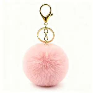 Soft 8cm pink faux fur pom pom keychain with gold swivel clasp for handbags and backpacks
