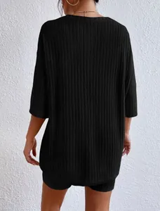 Back view of casual black ribbed loose-fitting summer top and shorts set.