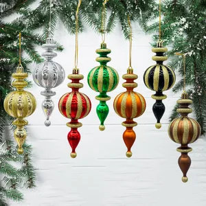 Set of seven colorful conical Christmas ornaments with gold glitter stripes on pine branches