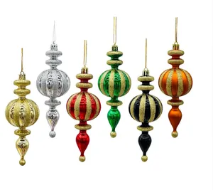 Set of six colorful spindle Christmas ornaments with gold glitter stripes