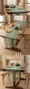 French style green lace table runner with intricate hollow design on rustic wooden table
